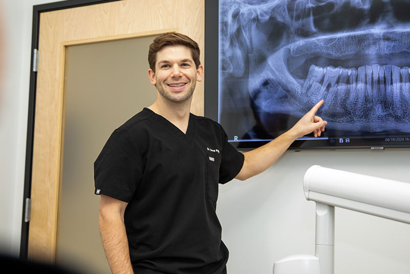 Doctor Showing A Patient Their X-Ray